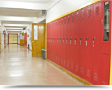 Interior of highschool hallway with student lockers.